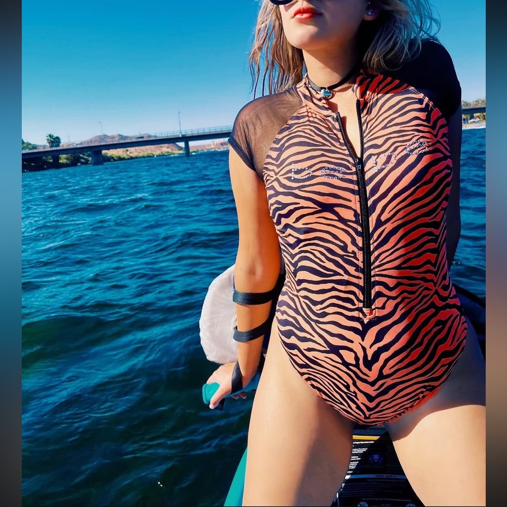BEBE Tiger Print One Piece with mesh shoulders